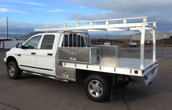 Lumber rack built by Highway Products for an aluminum truck flatbed with tool boxes to also keep your tool secure. This is a great contractor set-up. Take a look at our web site for more at www.highwayproducts.com