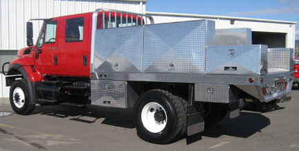 Off road fire fighting flatbed with tool boxes built by Highway Products.