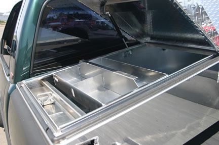 Truck tool storage trays lift out in Highway Products tool boxes. They're made of aluminum and can be powder coated your color.